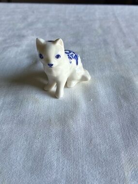 White Ceramic Cat Figurine with Blue Floral Detail